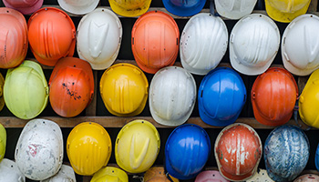 Protective head gear is necessary from falling objects in a construction site