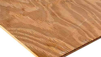 Plywood is usually coated with a fire resistant chemical adhesive